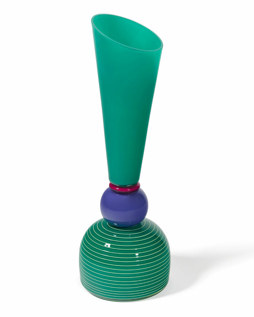 A modern vase with a tall, green, flared top, a purple spherical center, and a rounded, green-striped base.